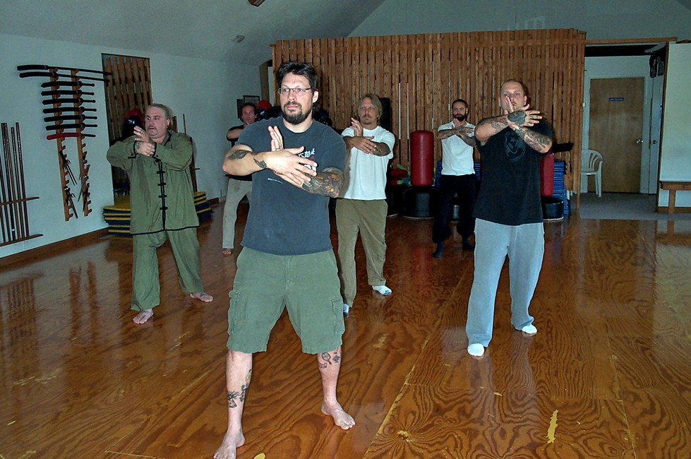 East Coast Martial Arts Tai Chi students practicing hand posture and alignment